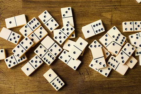 How to Learn to Play Dominoes