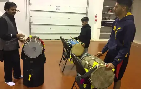 How to Learn to Play the Dhol
